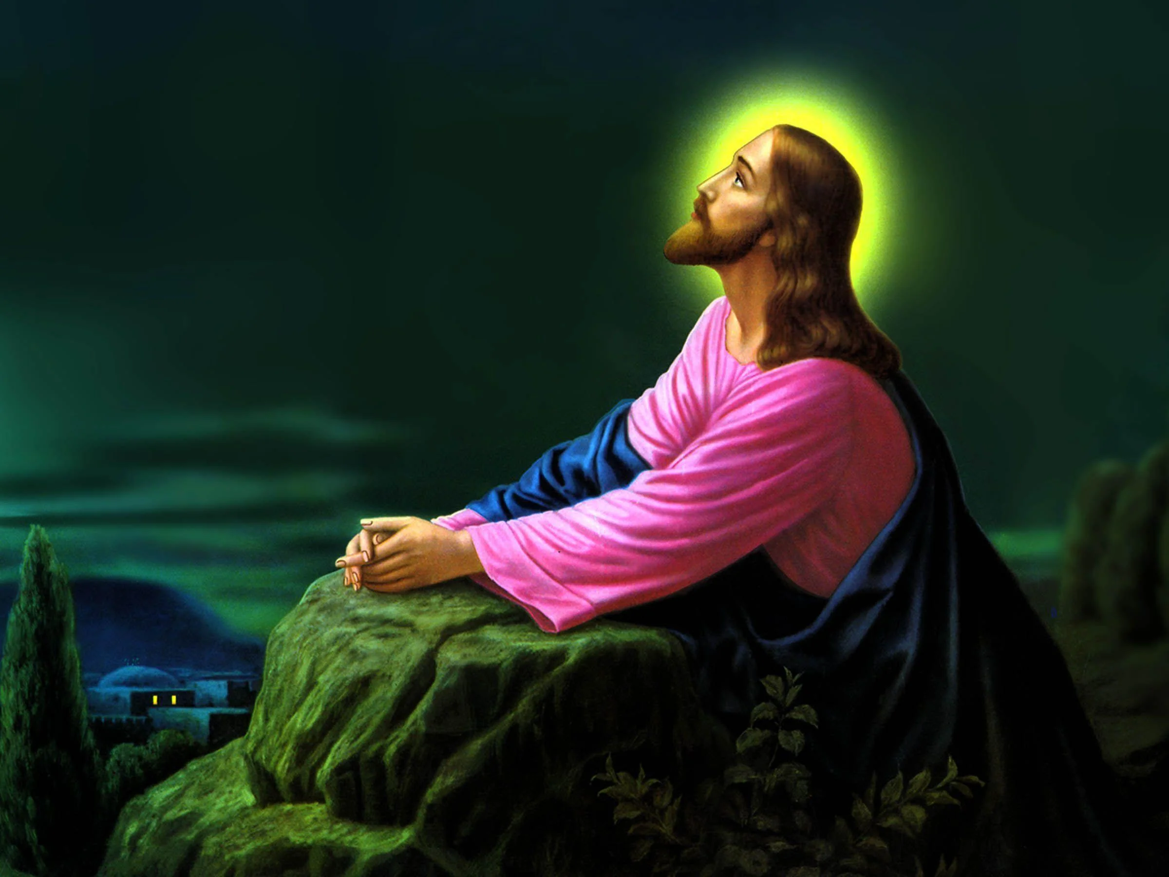 Chúa Jesus ngồi cầu nguyện trên tảng đá giữa thiên nhiên yên bình
