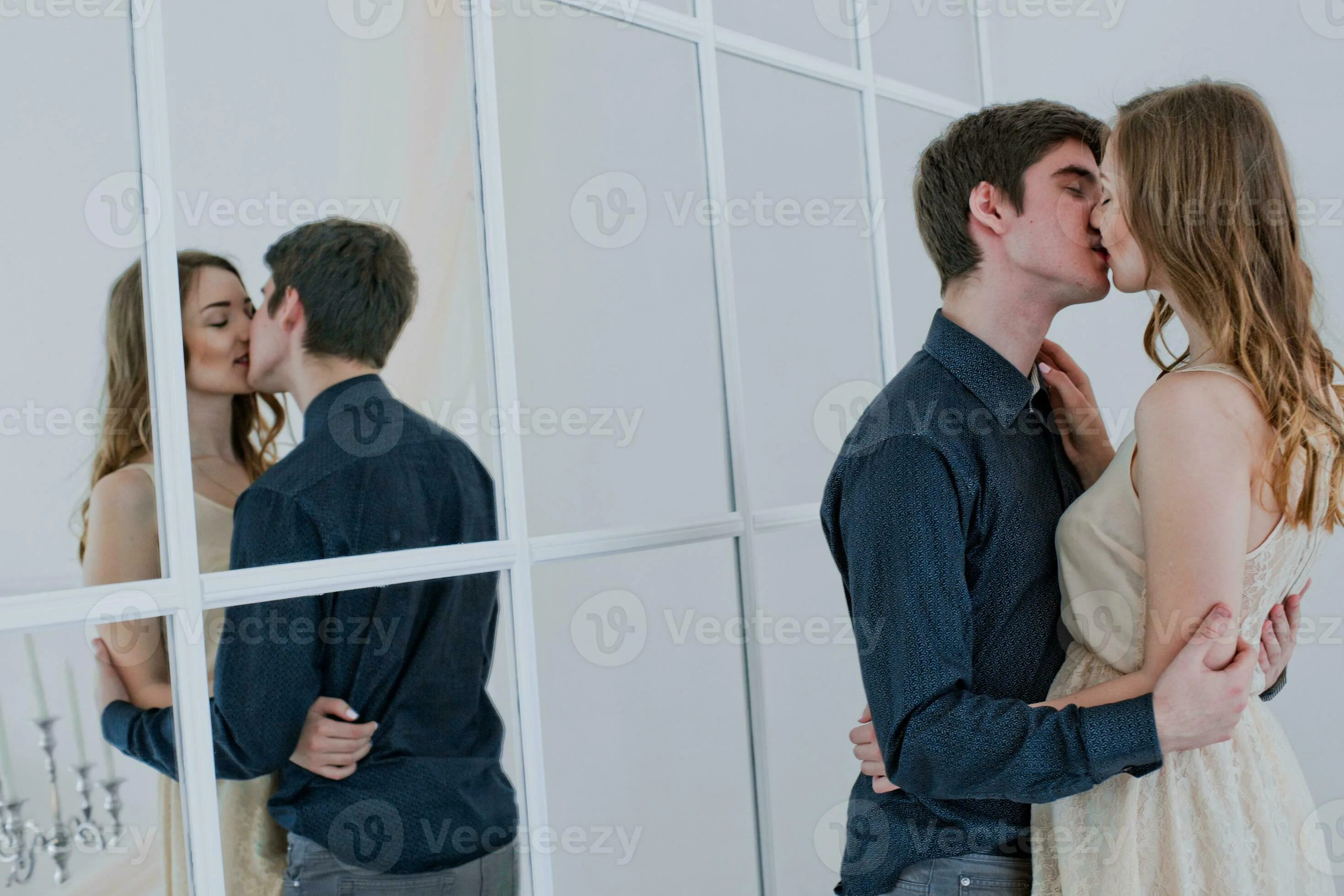 sex couple kisses. Lovers embrace. boy kisses girl on lips. Reflection of lovers in mirror. Happy couple in love. Valentine's Day. 33171603 Stock Photo at